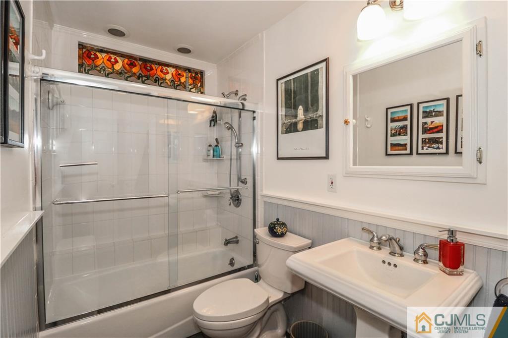 3 Whitewood Road Edison, NJ 08820 - Photo 22 of 28 a bathroom with a sink toilet and shower