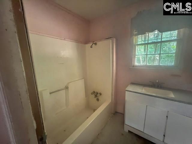 5545 Pisgah Road Rembert, SC 29128 - Photo 9 of 26 a bathroom with a granite countertop sink toilet and shower