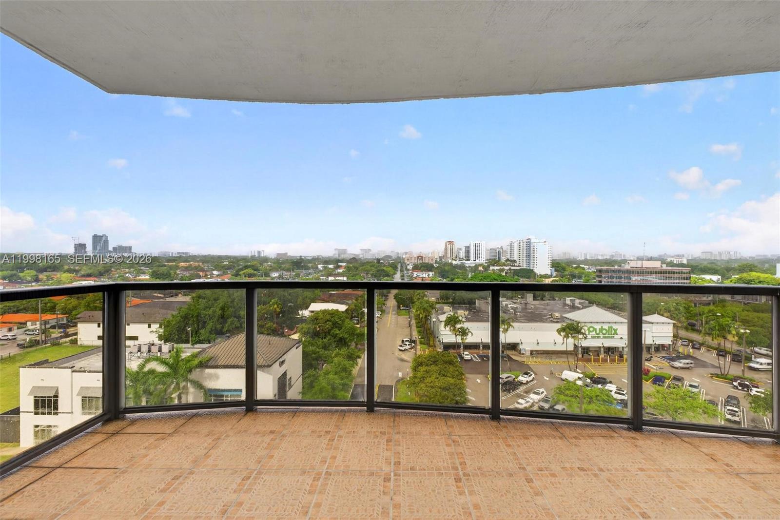 2301 Southwest 27th Avenue, Unit 906 Miami, FL 33145 - Photo 18 of 38 a view of ocean from a balcony