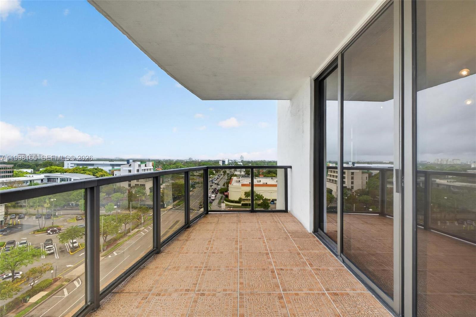 2301 Southwest 27th Avenue, Unit 906 Miami, FL 33145 - Photo 20 of 38 a view of balcony with city view