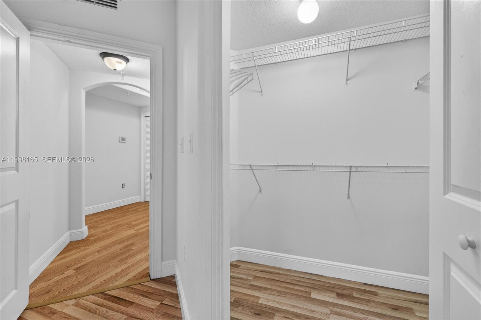 2301 Southwest 27th Avenue, Unit 906 Miami, FL 33145 - Photo 24 of 38 a view of a walk in closet