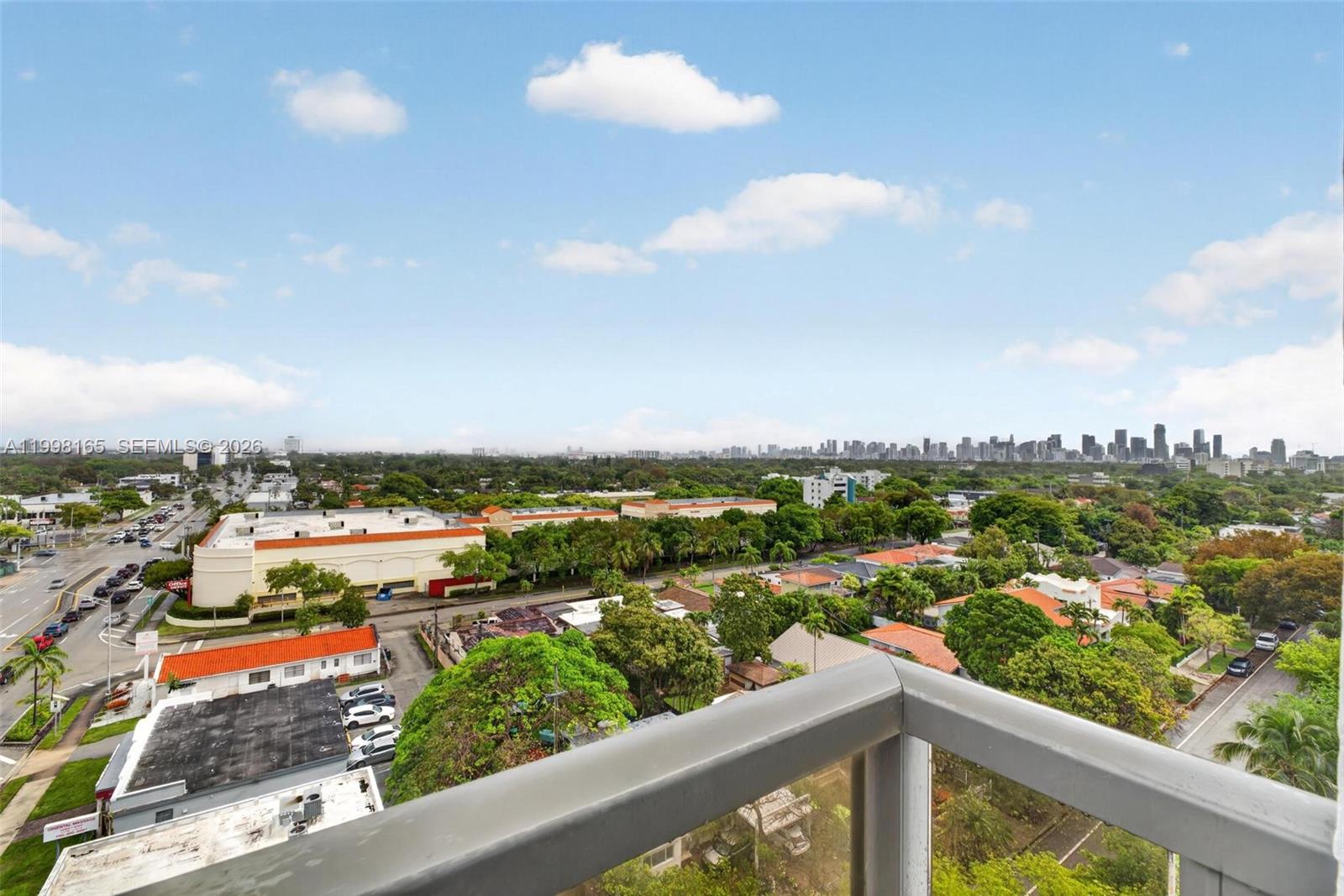2301 Southwest 27th Avenue, Unit 906 Miami, FL 33145 - Photo 31 of 38 a view of a city from a balcony