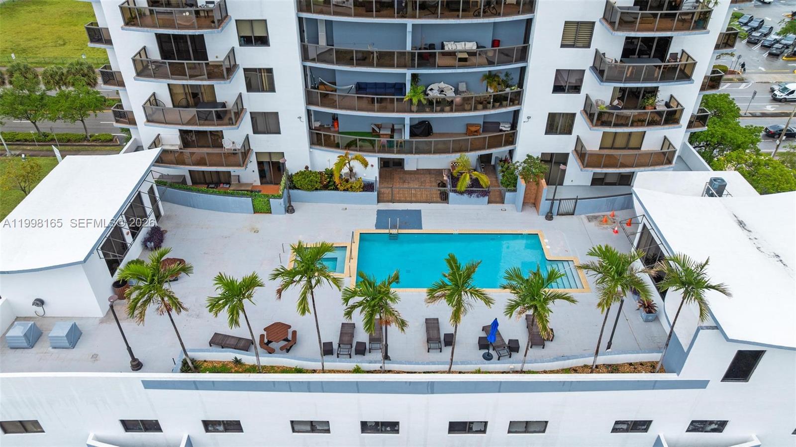 2301 Southwest 27th Avenue, Unit 906 Miami, FL 33145 - Photo 38 of 38 a view of outdoor space with plants