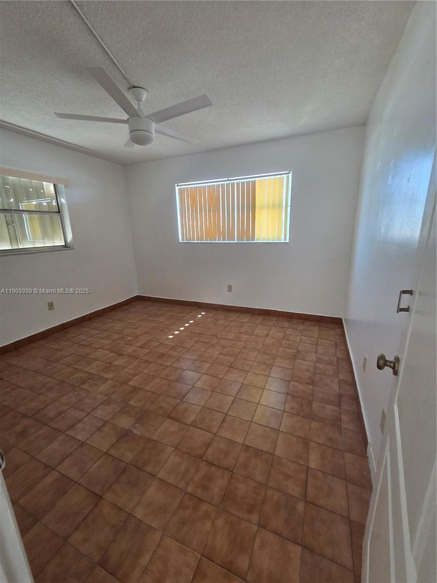 3640 Northwest 9th Street, Unit 407 Miami, FL 33125 - Photo 11 of 24 a view of an empty room