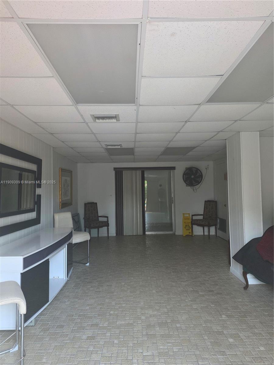 3640 Northwest 9th Street, Unit 407 Miami, FL 33125 - Photo 24 of 24 a living room with furniture