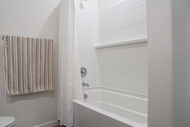 a bathroom with a bathtub