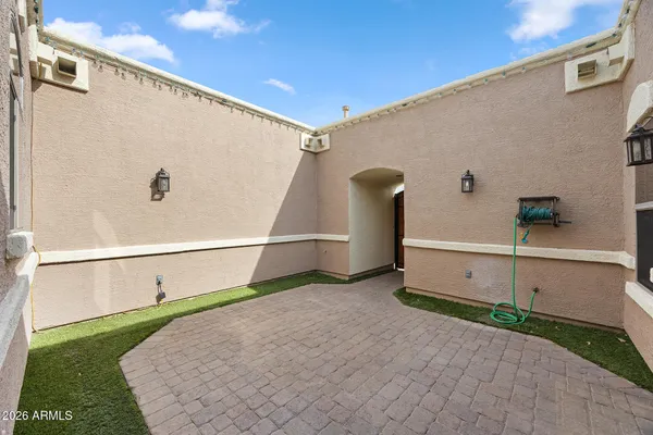 a view of an empty room with closet