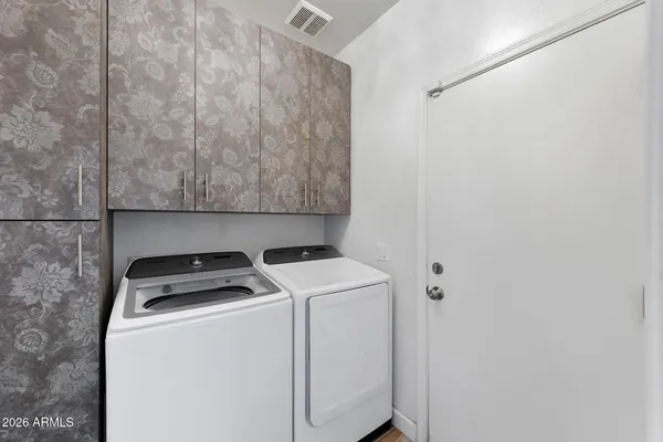 a kitchen with a refrigerator stove and sink