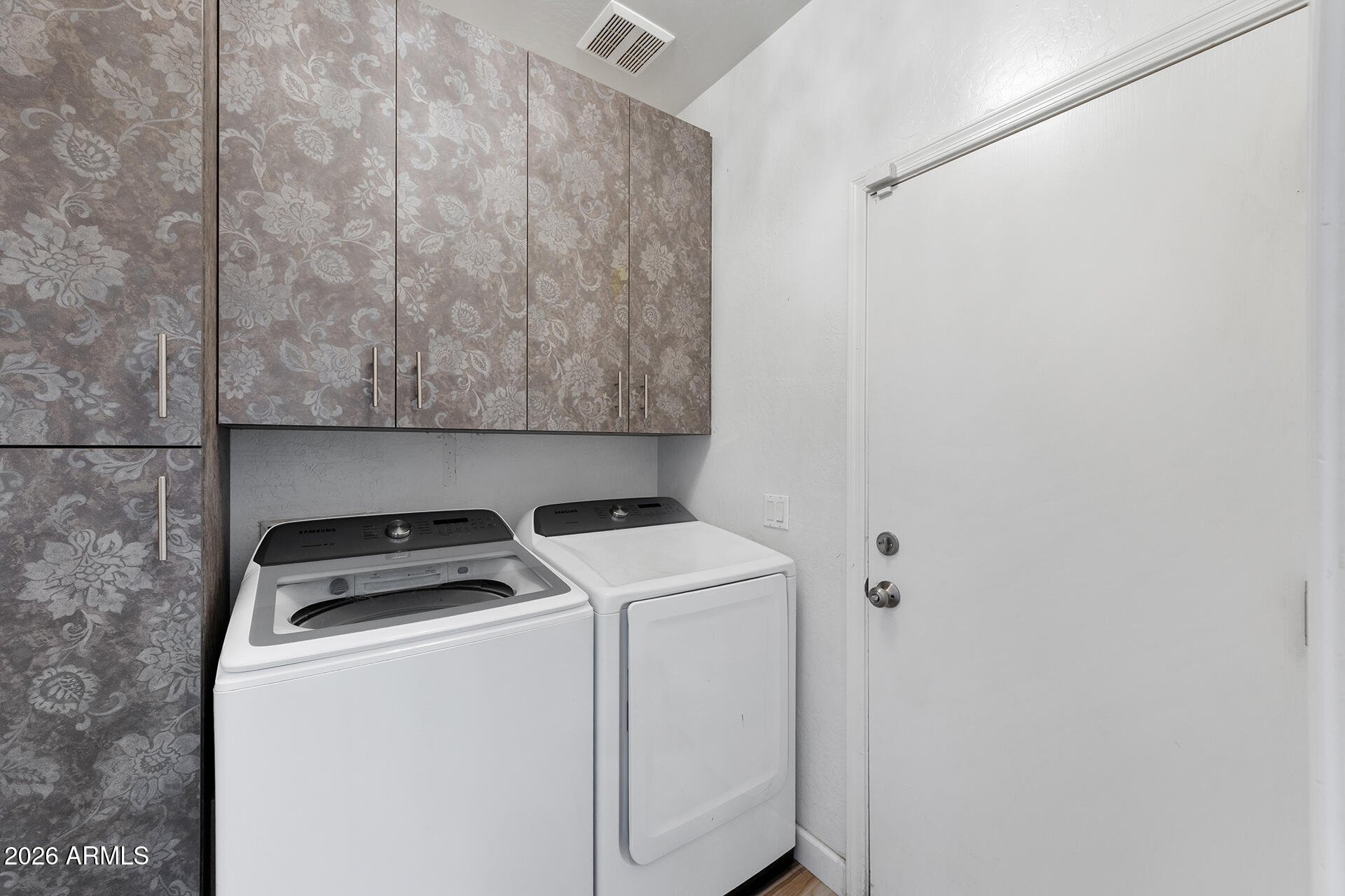608 West Gary Way Phoenix, AZ 85041 - Photo 26 of 48 a utility room with dryer and washer