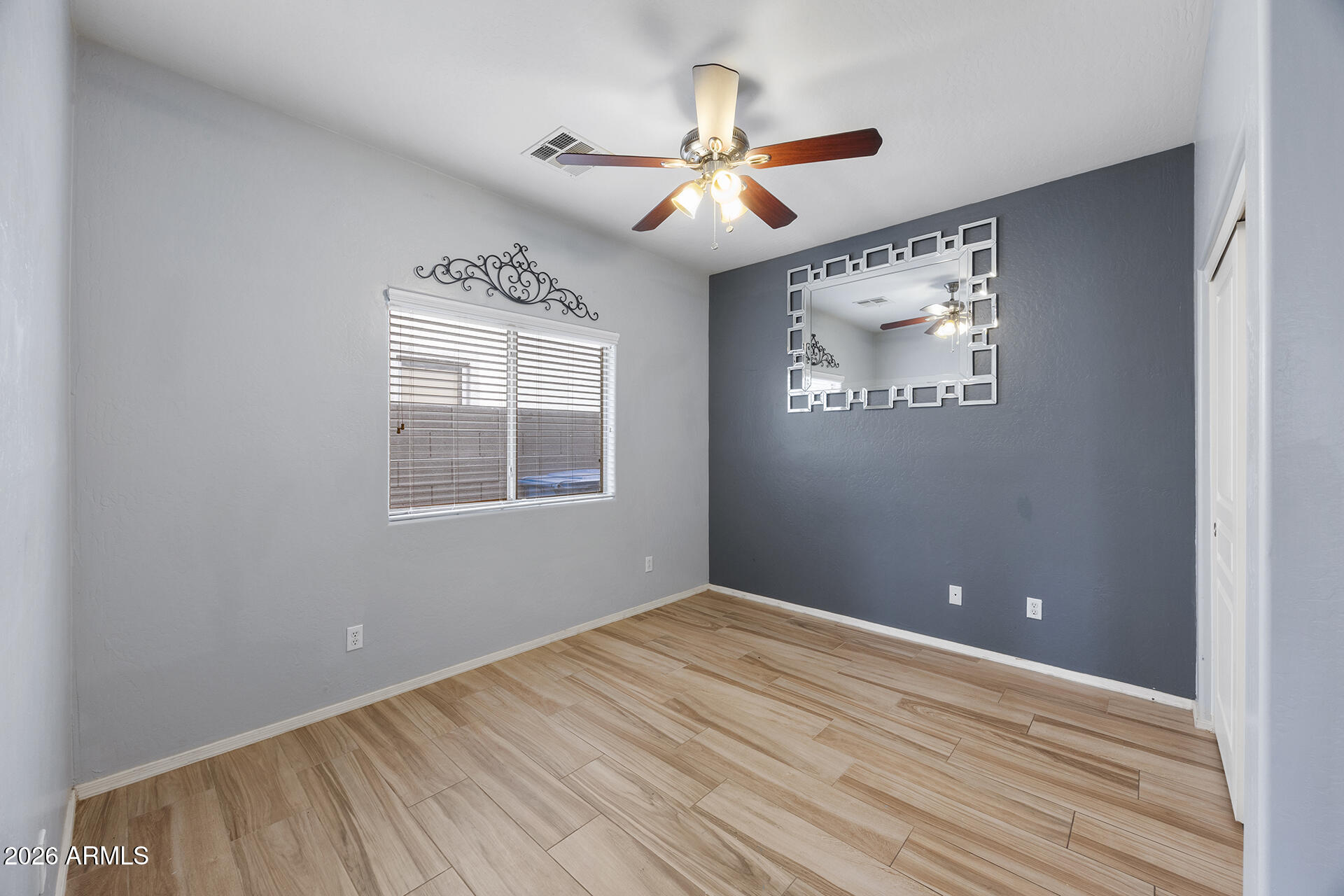 608 West Gary Way Phoenix, AZ 85041 - Photo 34 of 48 a view of an empty room with a window