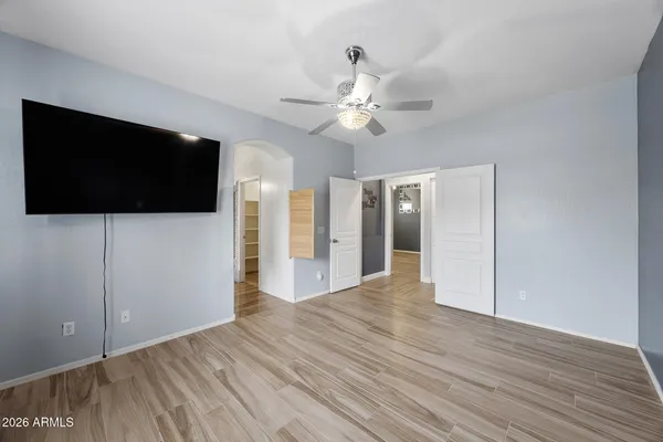 a view of an empty room with a window