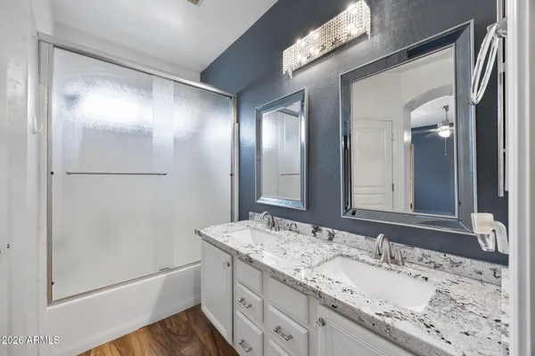 a view of a livingroom with wooden floor