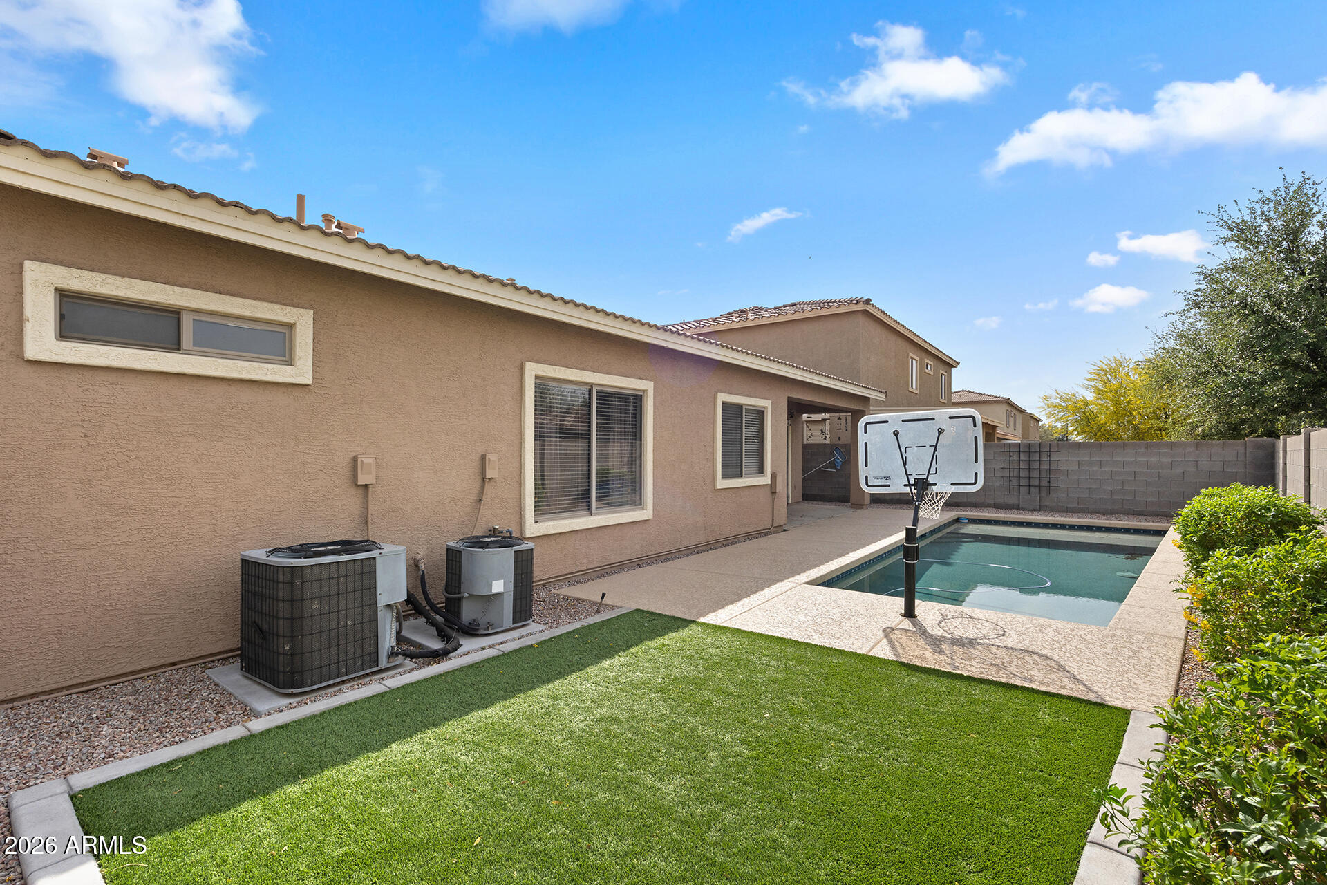 608 West Gary Way Phoenix, AZ 85041 - Photo 47 of 48 a front view of a house with garden