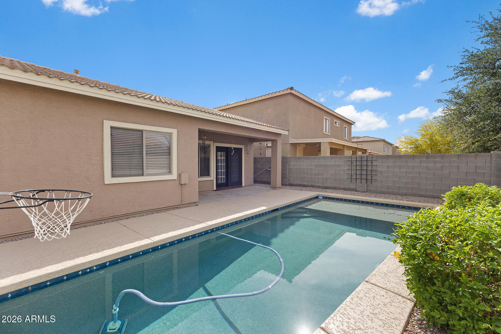 608 West Gary Way Phoenix, AZ 85041 - Photo 4 of 48 a view of a house with a backyard