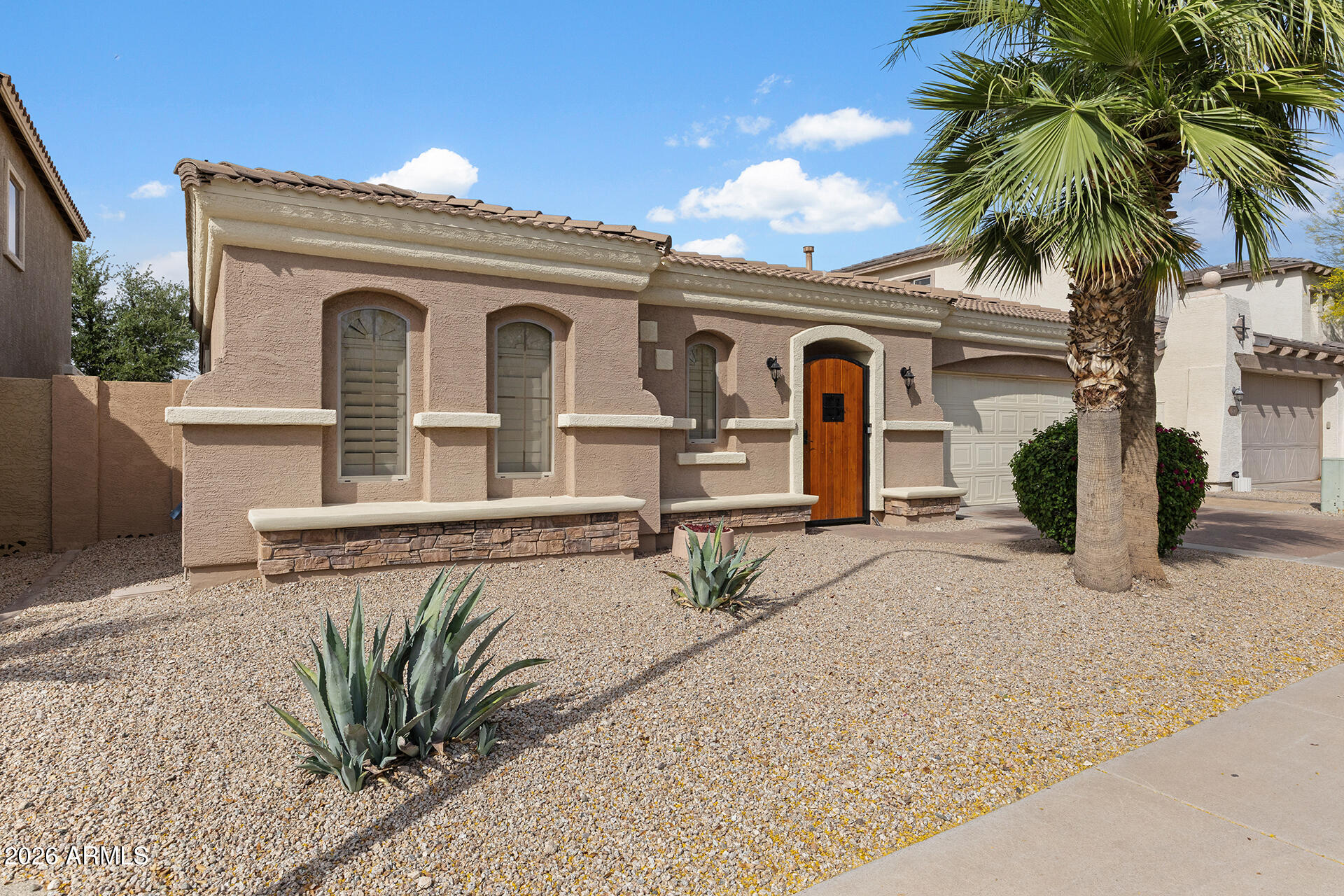 608 West Gary Way Phoenix, AZ 85041 - Photo 6 of 48 front view of a house with a yard