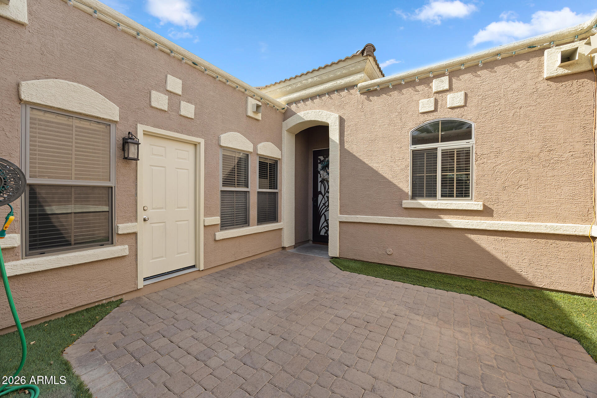 608 West Gary Way Phoenix, AZ 85041 - Photo 8 of 48 a front view of a house with a yard