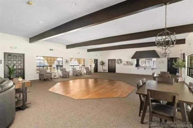a view of kitchen and dining area with furniture