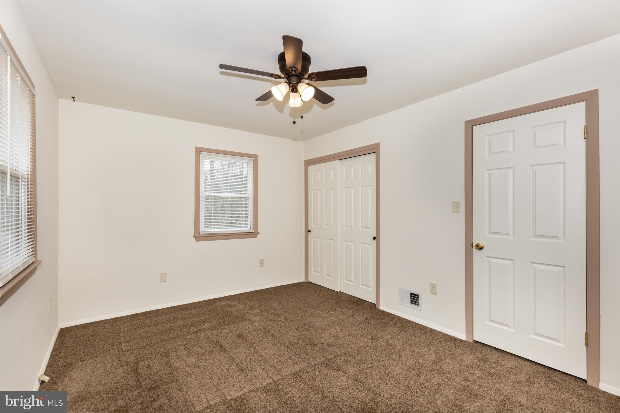 8240 WB&A Road Severn, MD 21144 - Photo 15 of 43 a view of empty room with ceiling fan