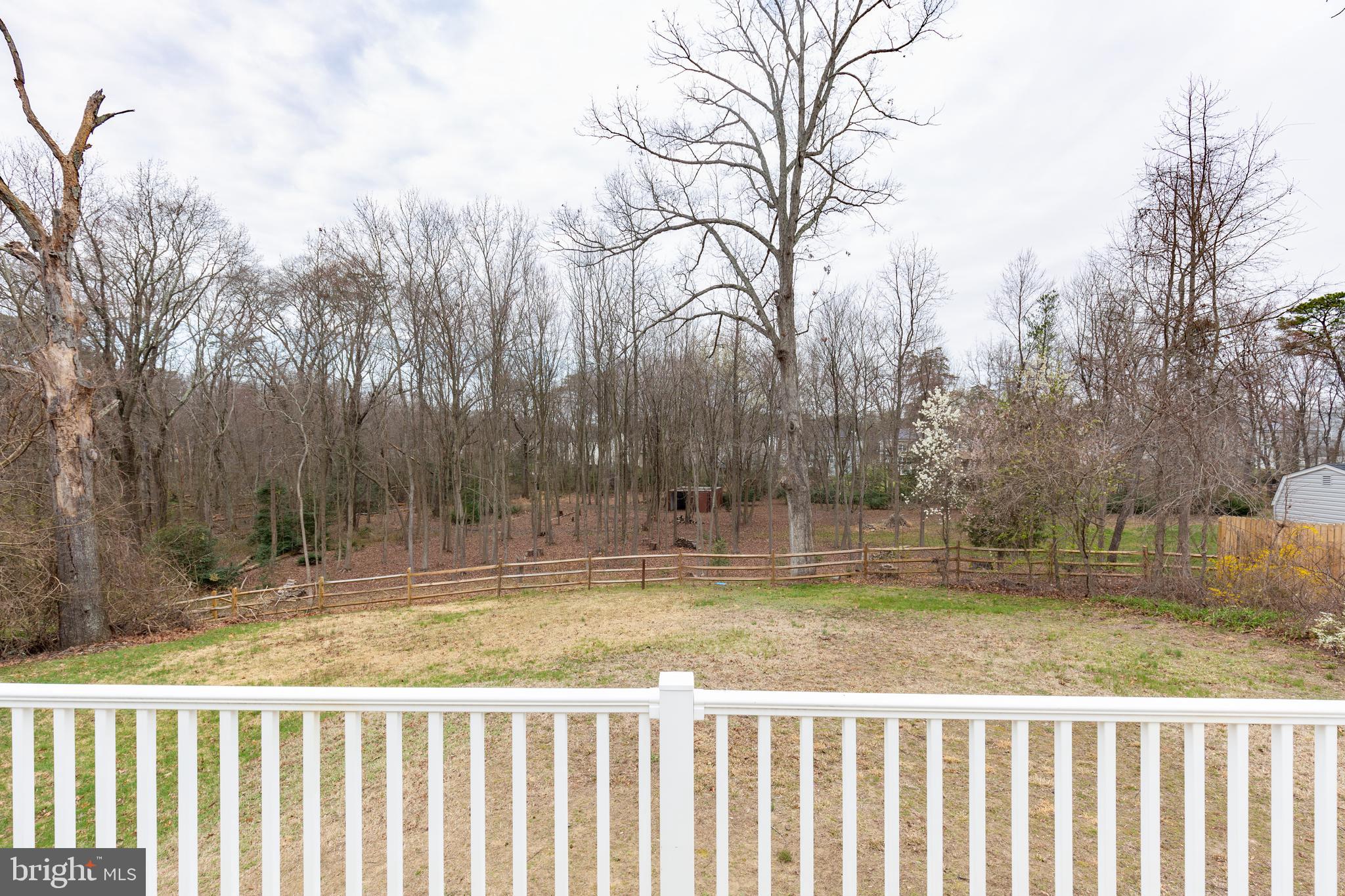8240 WB&A Road Severn, MD 21144 - Photo 42 of 43 a view of a yard with wooden fence