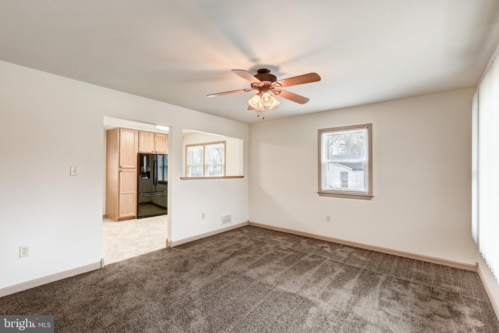 8240 WB&A Road Severn, MD 21144 - Photo 6 of 43 a view of empty room with ceiling fan