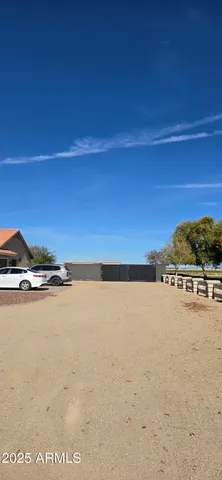 a living room with stainless steel appliances kitchen island granite countertop furniture and a kitchen view