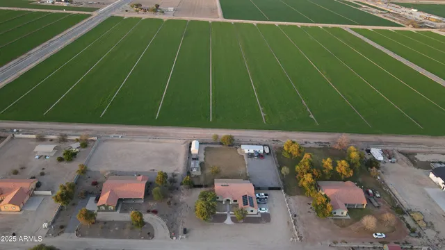 a bathroom with a sink mirror and vanity