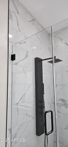 a front view of house with yard and trees