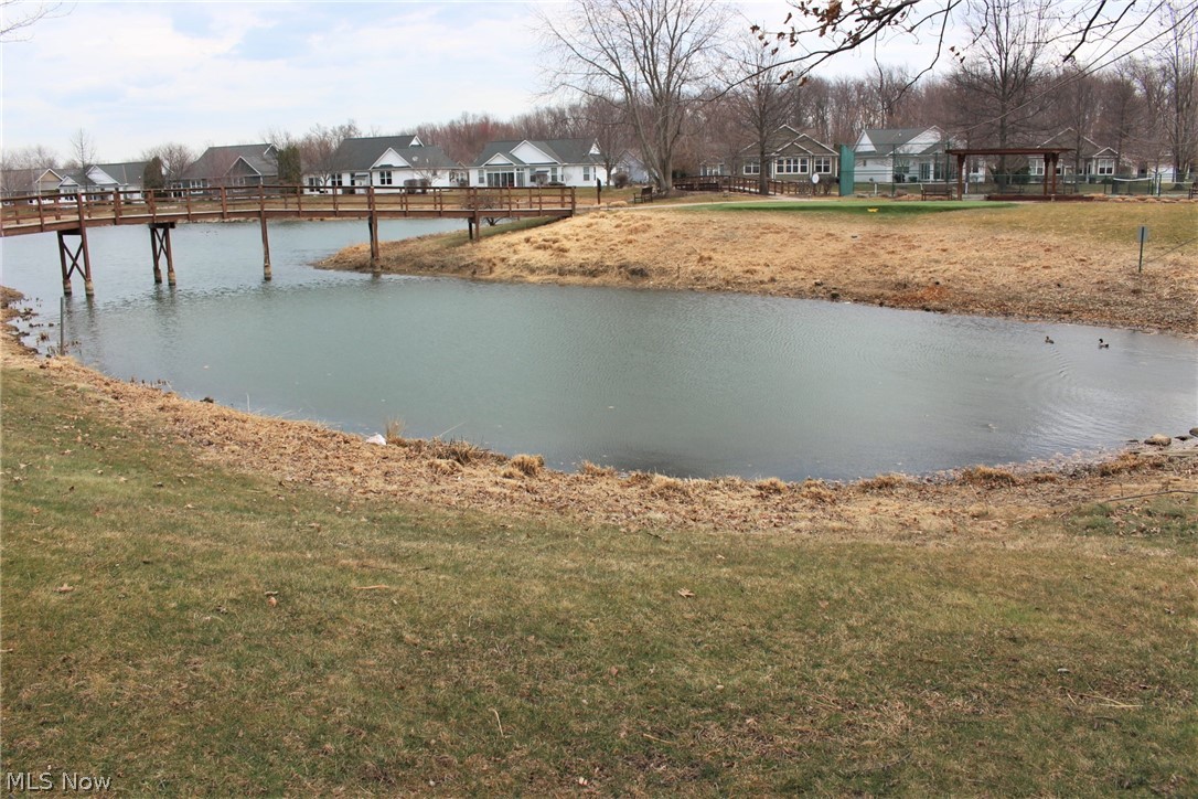 2354 Roxbury Road Avon, OH 44011 - Photo 34 of 35 One of the Ponds with a bridge.