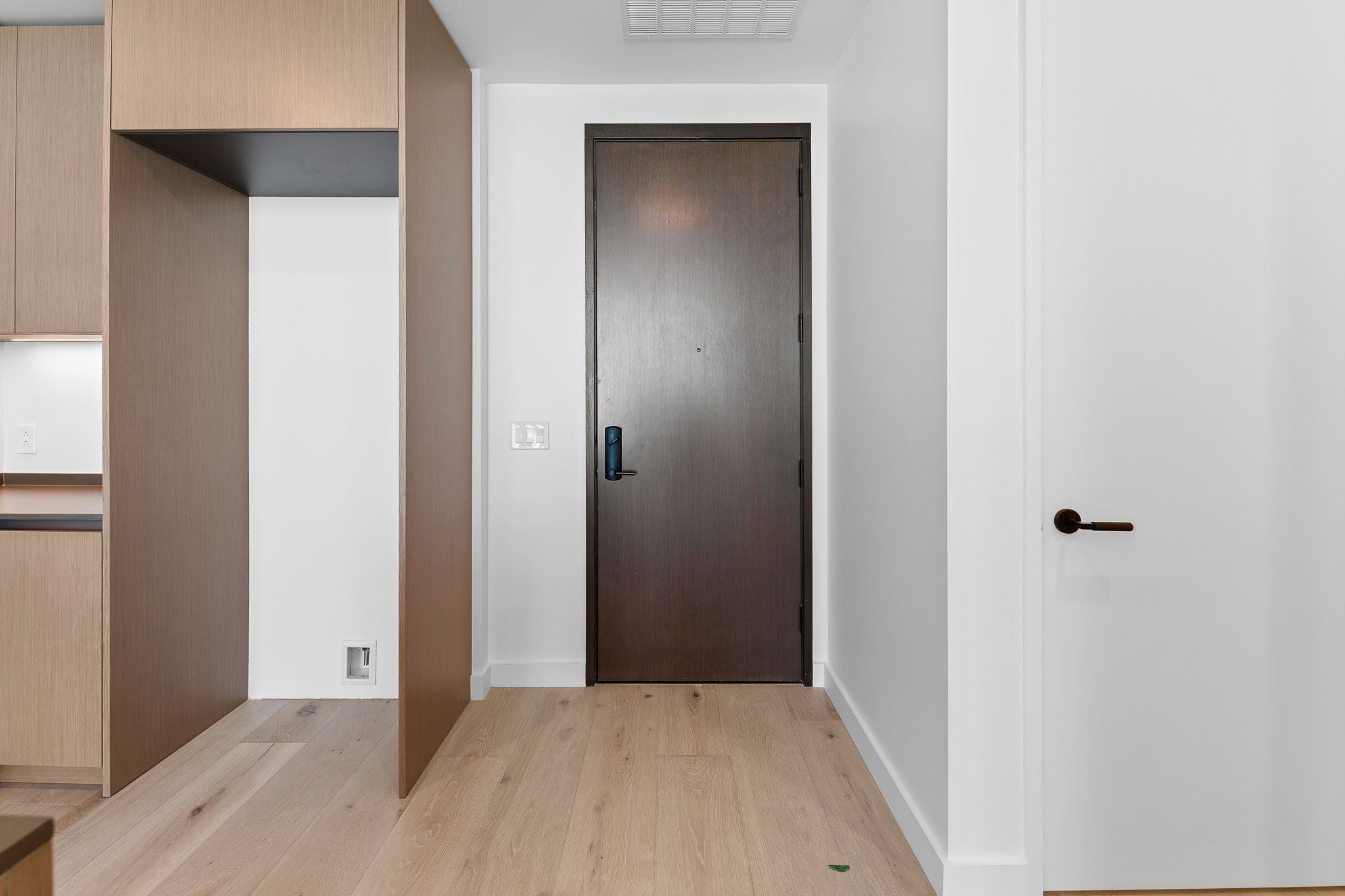 610 Davis Street, Unit 5206 Austin, TX 78701 - Photo 25 of 35 a view of a small space with wooden floor