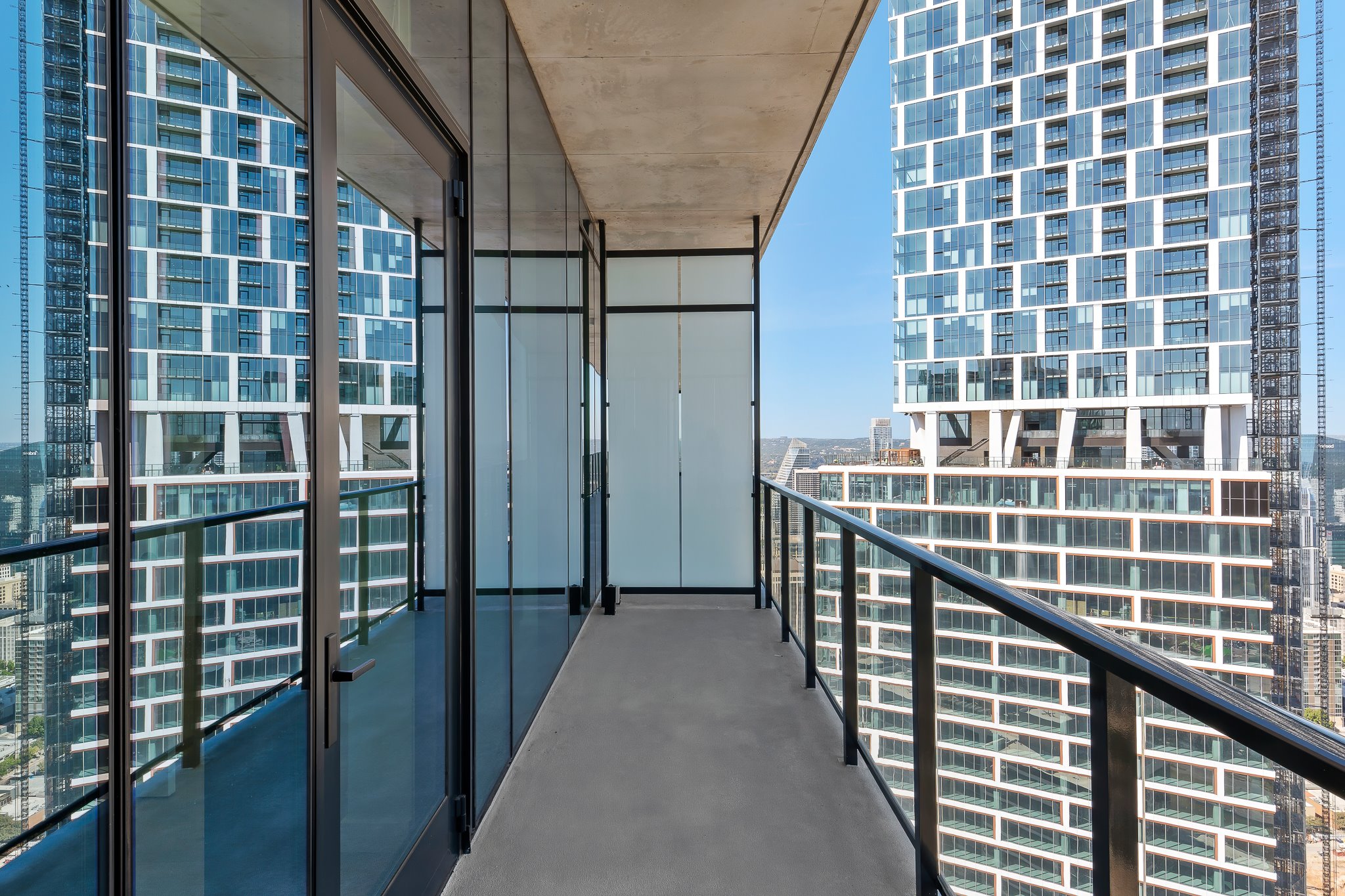 610 Davis Street, Unit 5206 Austin, TX 78701 - Photo 32 of 35 a view of balcony with a stairs