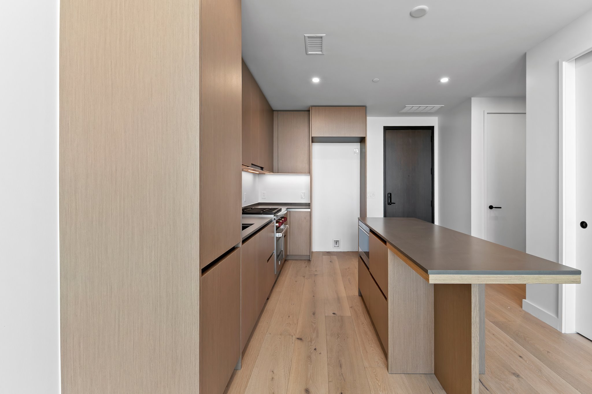610 Davis Street, Unit 5206 Austin, TX 78701 - Photo 5 of 35 a view of hallway with wooden floor