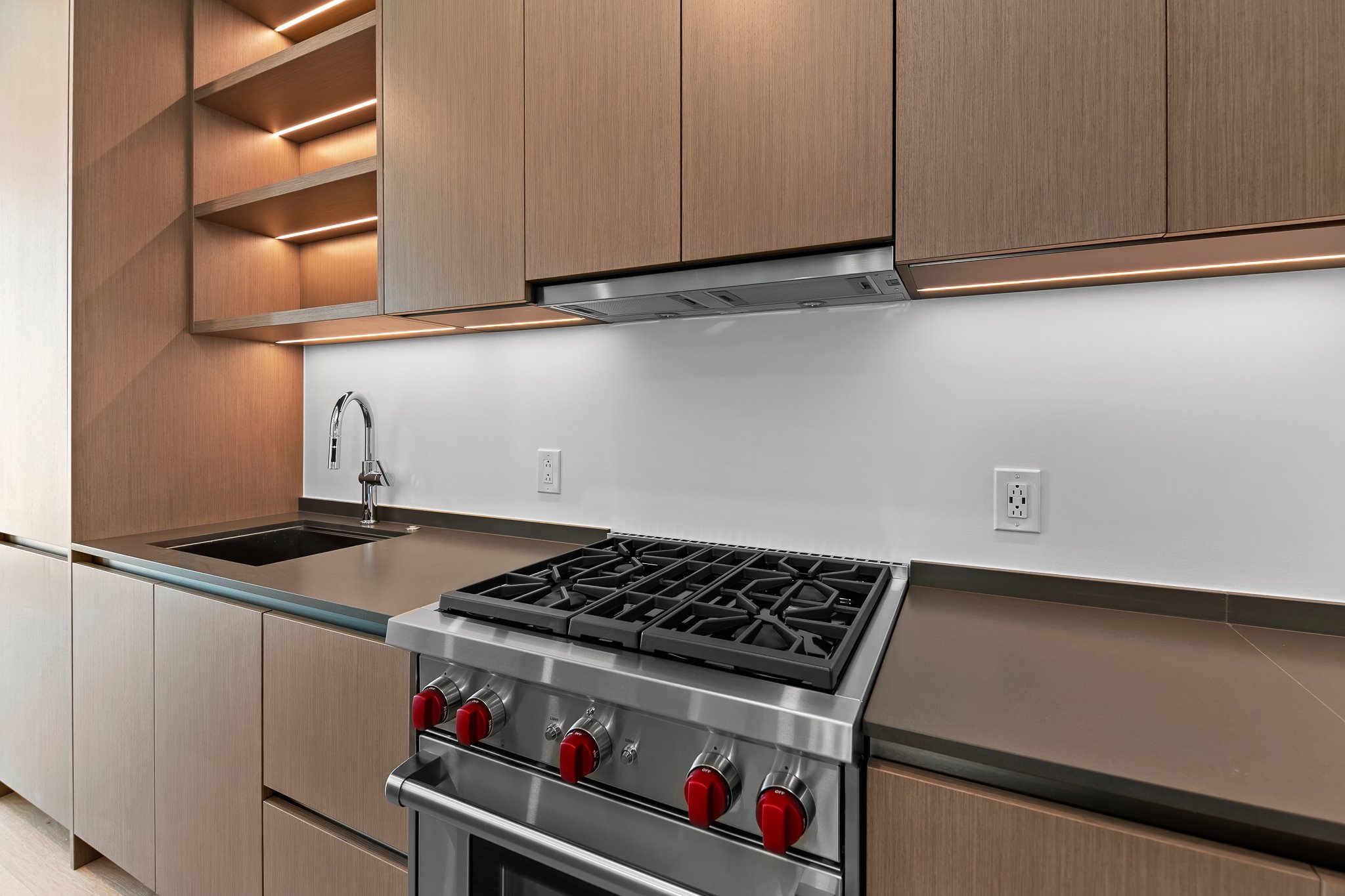 610 Davis Street, Unit 5206 Austin, TX 78701 - Photo 8 of 35 a stove top oven sitting inside of a kitchen