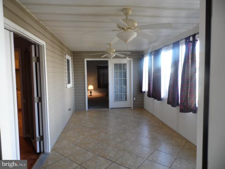 7 Ritchie Drive New Castle, DE 19720 - Photo 5 of 15 Enclosed Porch