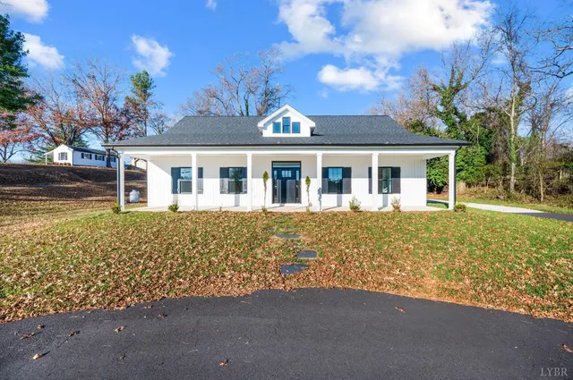 a view of a house with a garden