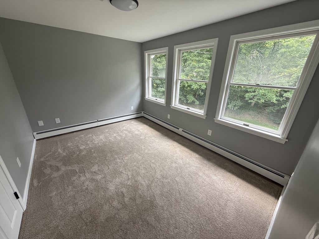 295 Frenchtown Road East Greenwich, RI 02818 - Photo 17 of 26 a view of an empty room with a window