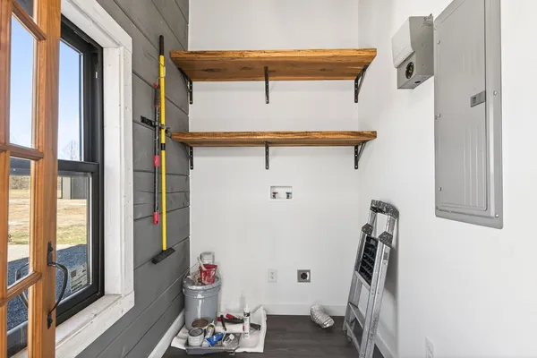 a view of a brick house with a patio