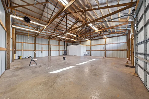a house view with a swimming pool and outdoor space