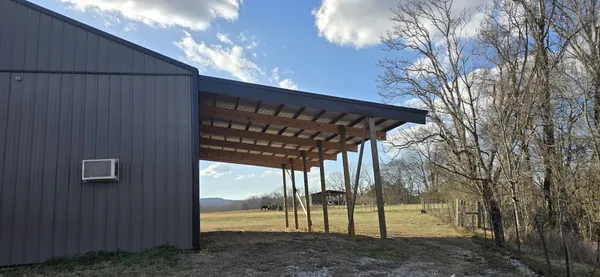 a view of a porch with a backyard