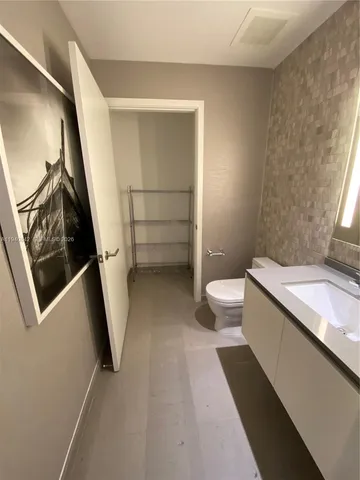 a bathroom with a sink and a toilet