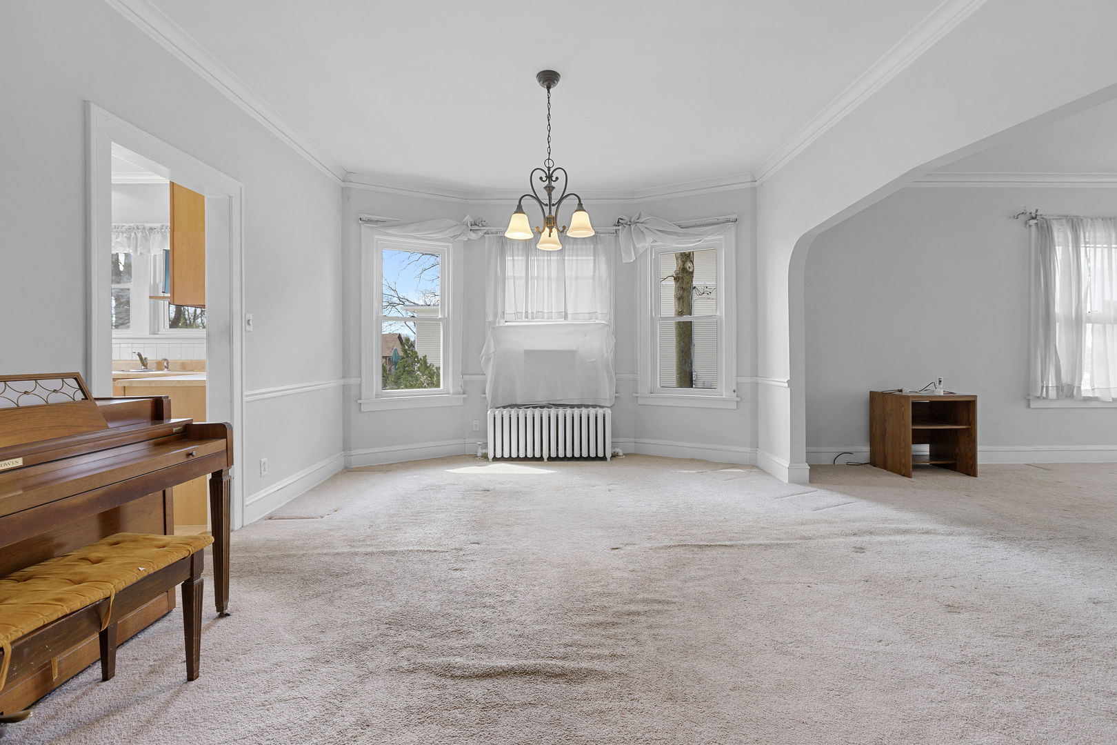 825 St John Street Elgin, IL 60120 - Photo 9 of 28 a view of a livingroom with furniture and a window