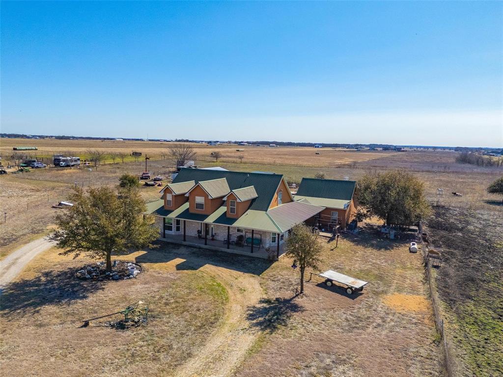 346 Forreston Road Waxahachie, TX 75165 - Photo 32 of 36 an aerial view of a house with a yard and lake view
