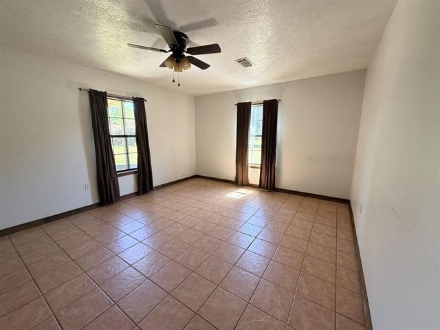 8957 Tejas Lane Silsbee, TX 77656 - Photo 34 of 50 a view of an empty room with windows