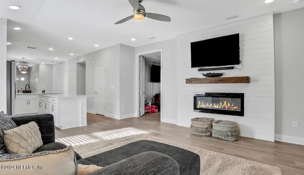 45 Vicksburg Drive St. Johns, FL 32259 - Photo 22 of 39 a bedroom with furniture and a flat screen tv