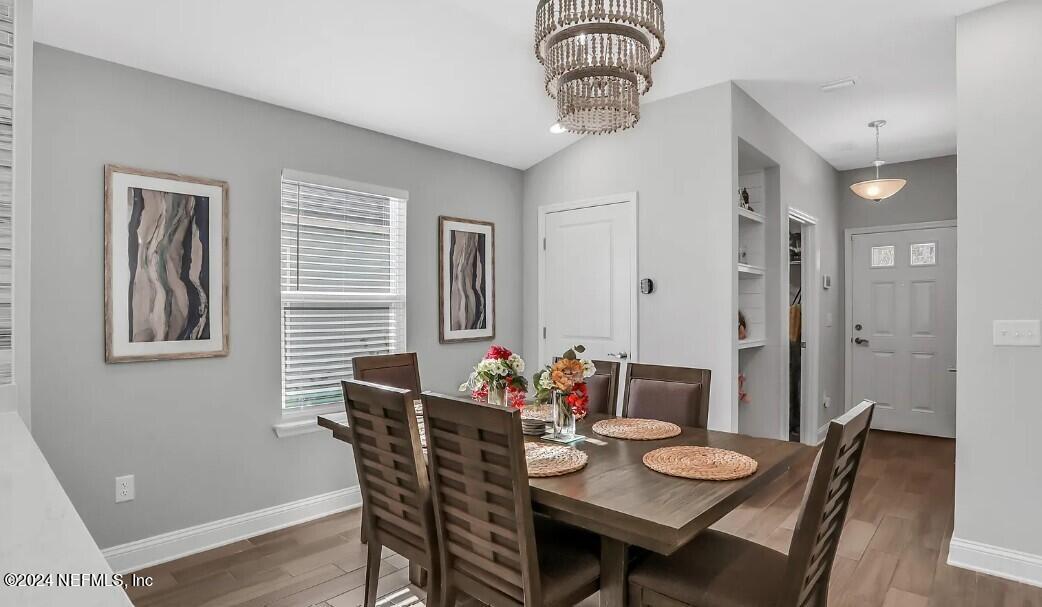 45 Vicksburg Drive St. Johns, FL 32259 - Photo 24 of 39 a view of a dining room with furniture window and wooden floor