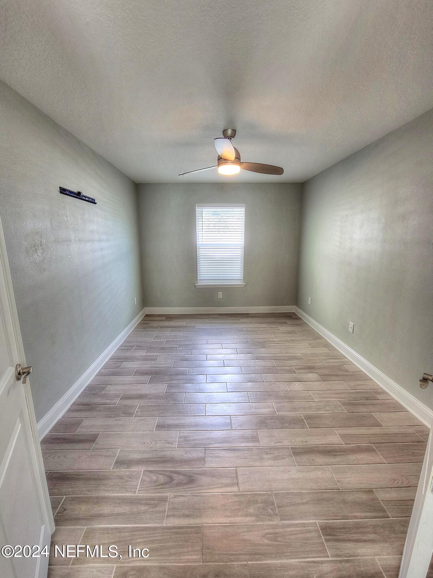 45 Vicksburg Drive St. Johns, FL 32259 - Photo 7 of 39 a view of room window and hardwood floor