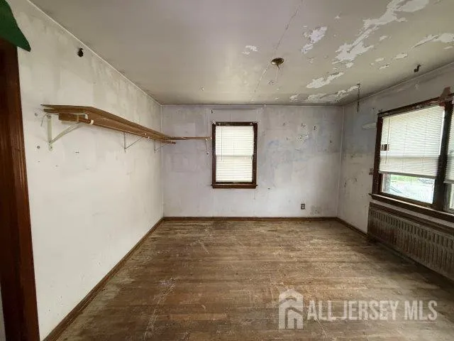 an empty room with windows