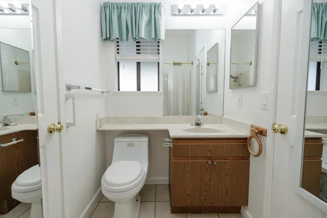 a view of a yard with cars