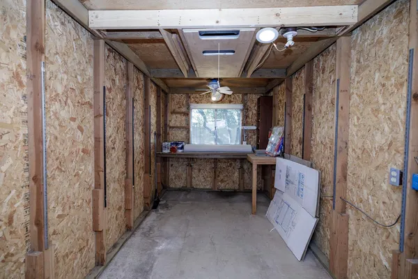 a view of entryway with a front door and outdoor seating