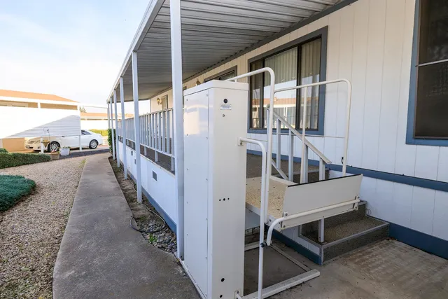 a view of a balcony with staircase