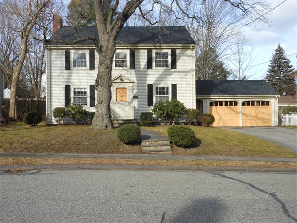 57 Buckingham Road Milton, MA 02186 - Photo 8 of 9 a view of a house with a yard and plants